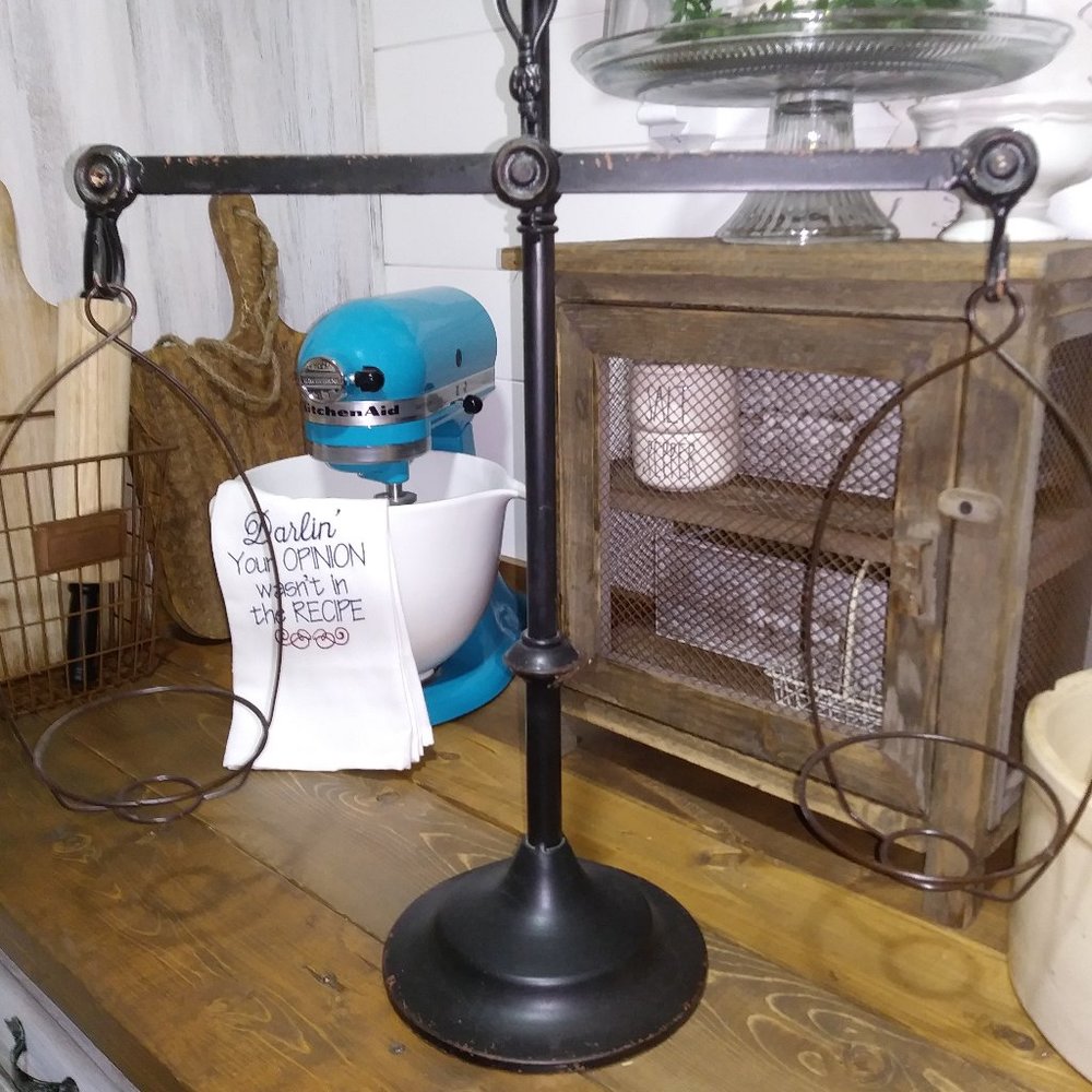 Farmhouse scale decor with metal baskets